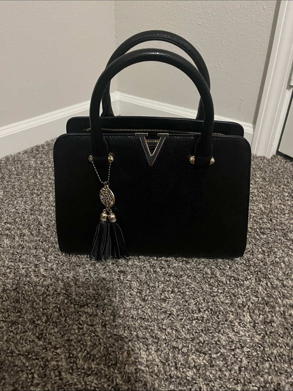 Structured Black Top-Handle Satchel with Tassel Charm